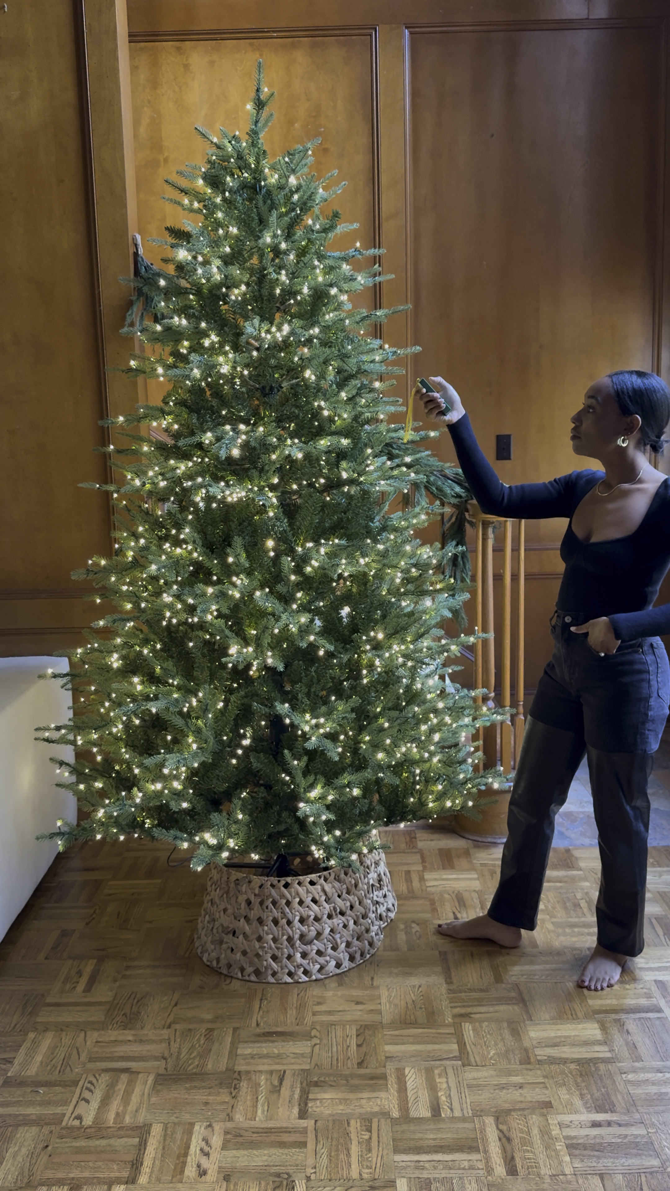 7.5ft pre lit Christmas tree, comes with remote to adjust lights. They can go from white lights, to colorful, to twinkle lights with a push of a button 

#LTKHoliday #LTKHome #LTKVideo