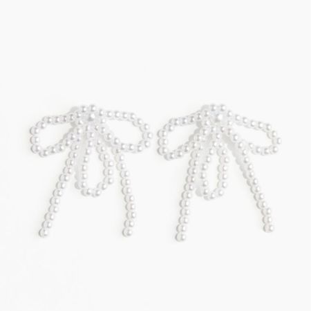 Pearl bow earrings 

#LTKfindsunder50 #LTKSeasonal #LTKstyletip