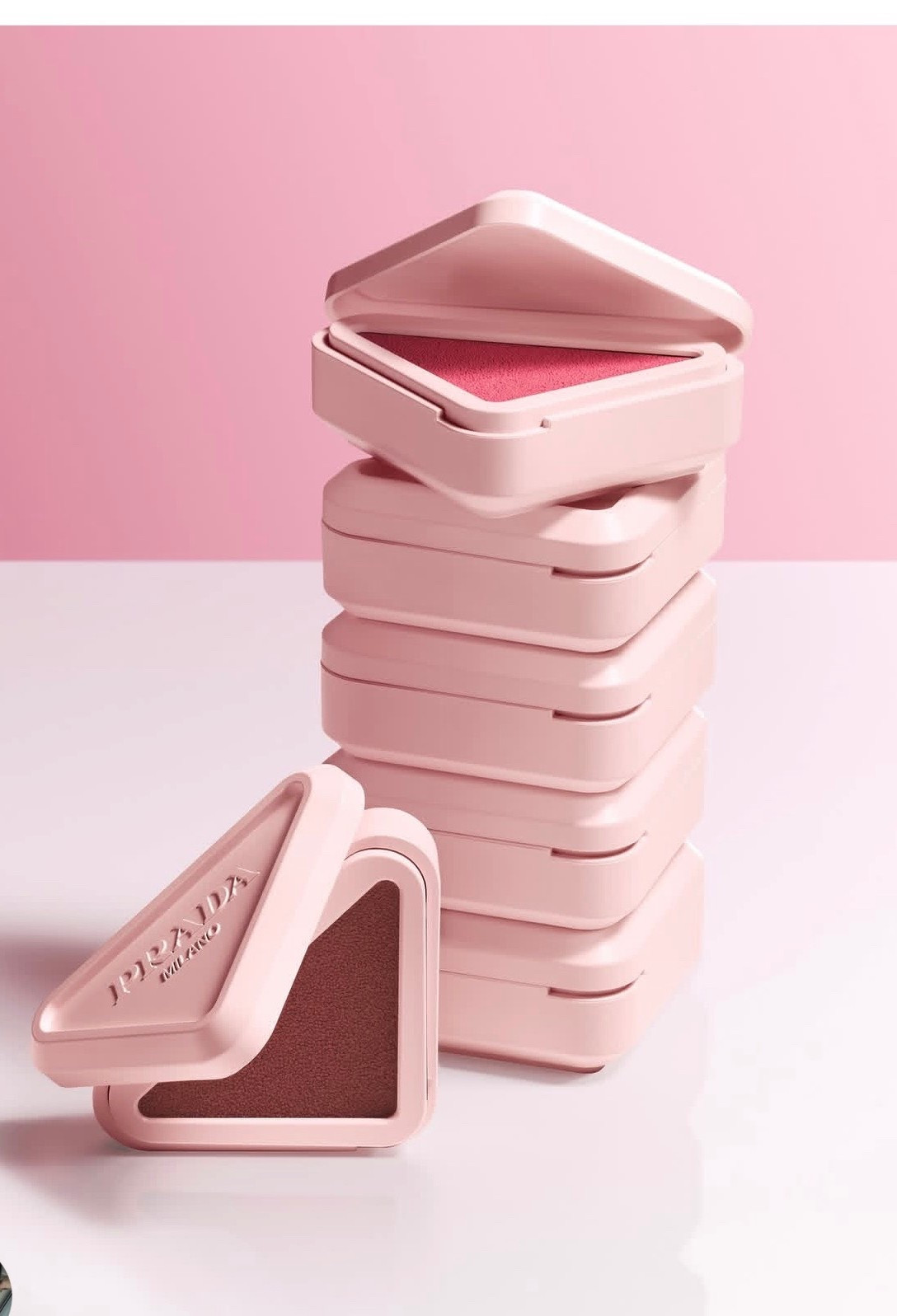 Prada Touch Cream-to-Powder Blush 
Prada Touch is a new, highly pigmented cream-to-powder blush, featuring a soft-matte, blurred finish for cheeks and lips. It offers up to 12-hour wear in 8 versatile shades, housed in signature stackable, triangular packaging

#LTKBeauty #LTKTravel #LTKWorkwear