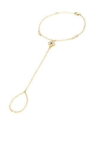 NAiiA Aya Hand Chain in Metallic Gold. | Revolve Clothing (Global)