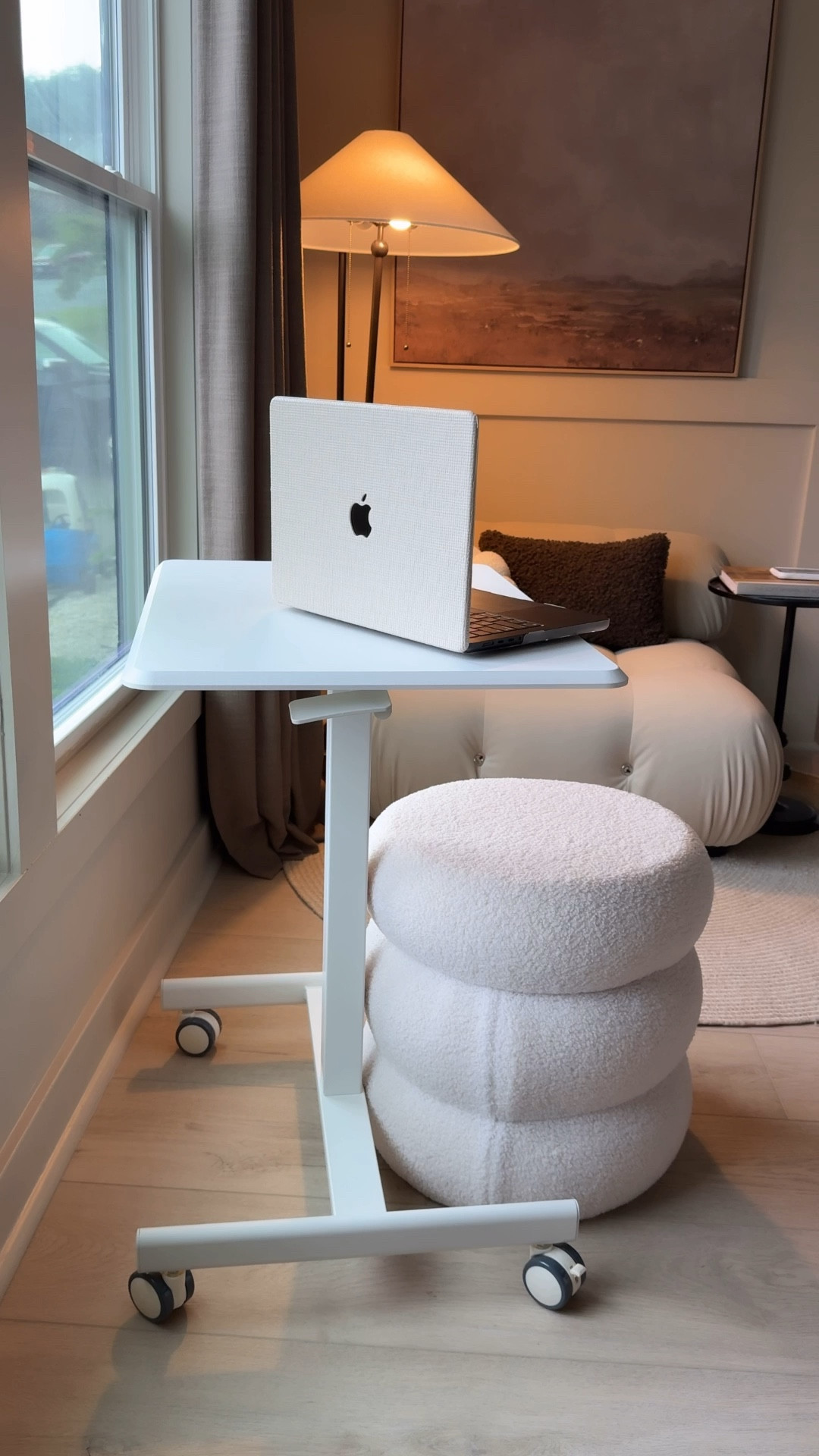 Adjustable desk and Bouclé ottoman 