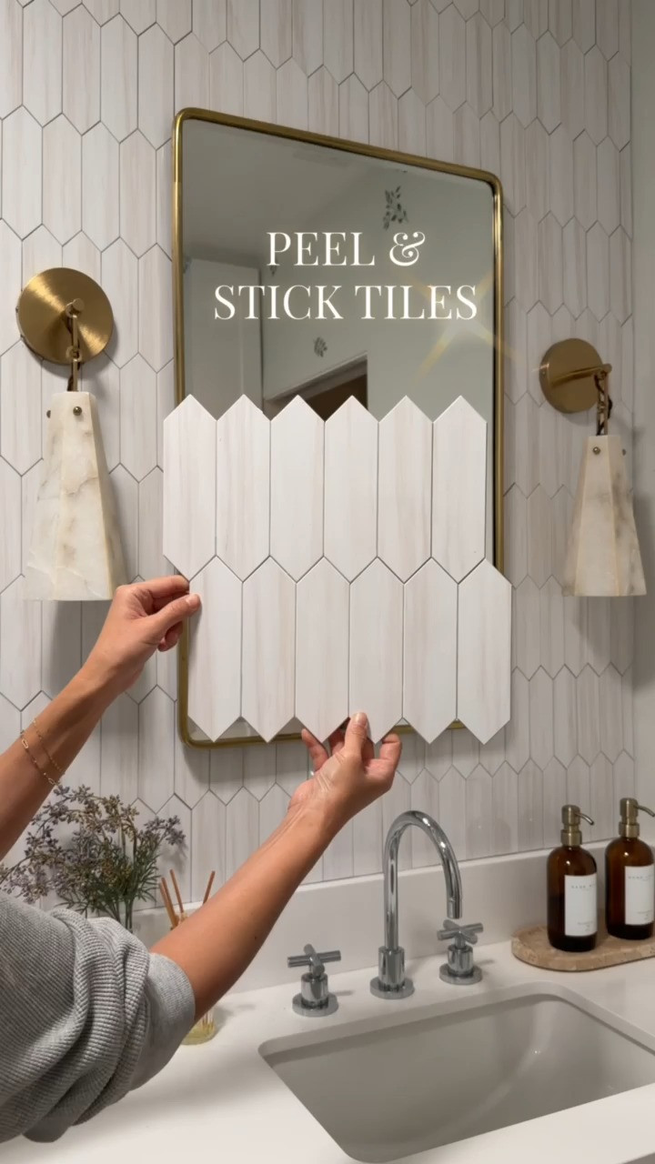 This peel and stick tile looks high end and amazing quality!
They're not going anywhere once you install them. The sconces are such an amazing price point and under $200!
Bath Reno on a budget! 

 

#LTKHome #LTKSaleAlert