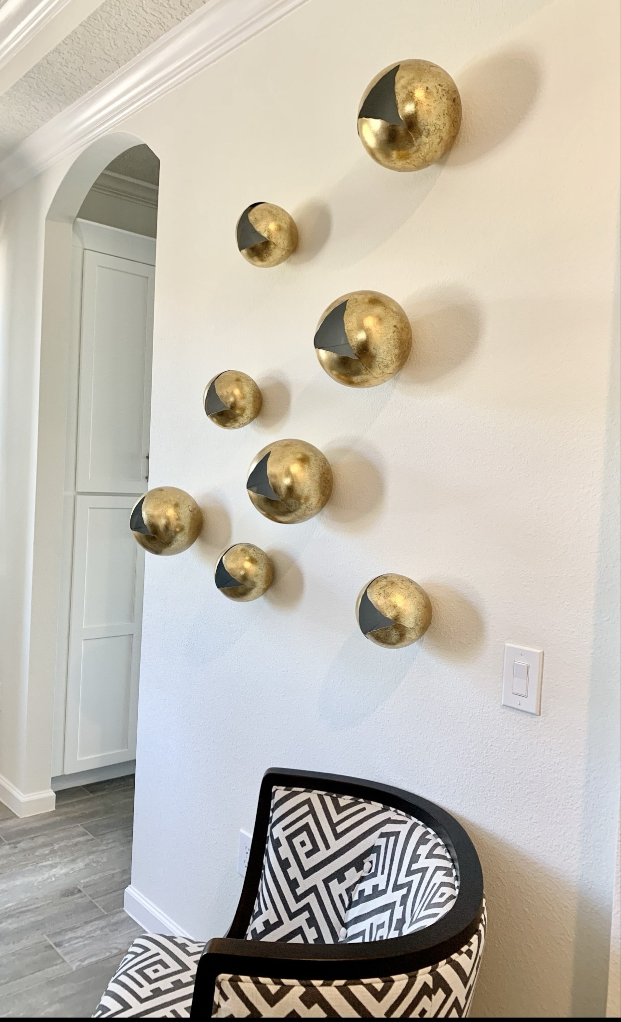 Looking for a simple idea for an open wall?  Try these metallic accents for your open wall space.  3D effect gives a stylish statement piece #accentwall #metallicaccents #walldecor

#LTKhome #LTKGiftGuide