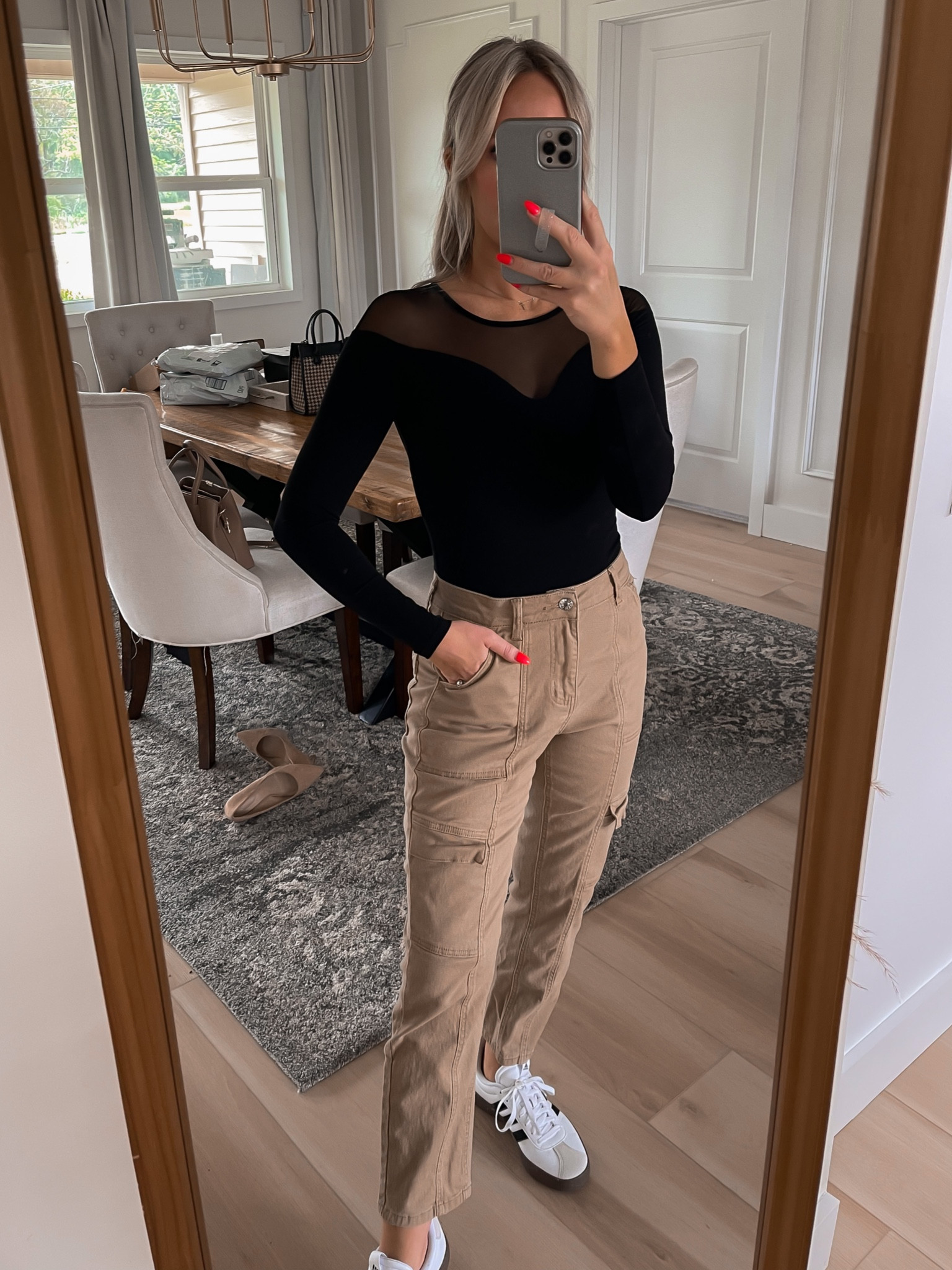 This black bodysuit is buttery soft and has great stretch to the fabric. Perfect date night top or to pair with a skirt for holiday parties. I went down to a size XS but would reccomend going with your normal size. Comes in multiple colors. My cargo pants are Amazon and fit slightly large. If in-between I recommend going down a size. 5’3” for reference 

Amazon bodysuit, Amazon top, fall top,
Amazon cargo pants, Amazon fall outfit, Halloween colors, date night outfit, black bodysuit, ankle pants, sheer top, mesh top 

#LTKSeasonal #LTKfindsunder50 #LTKHoliday