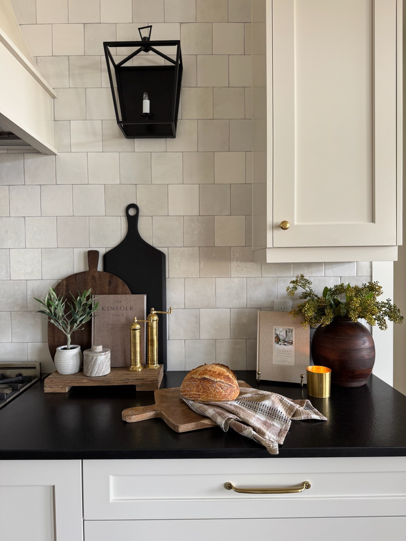 The sweetest functional and beautiful kitchen styling for spring! I love displaying my most used pieces such as our cookbooks, butter keeper, and salt and pepper grinders! 

#LTKHome #LTKStyleTip