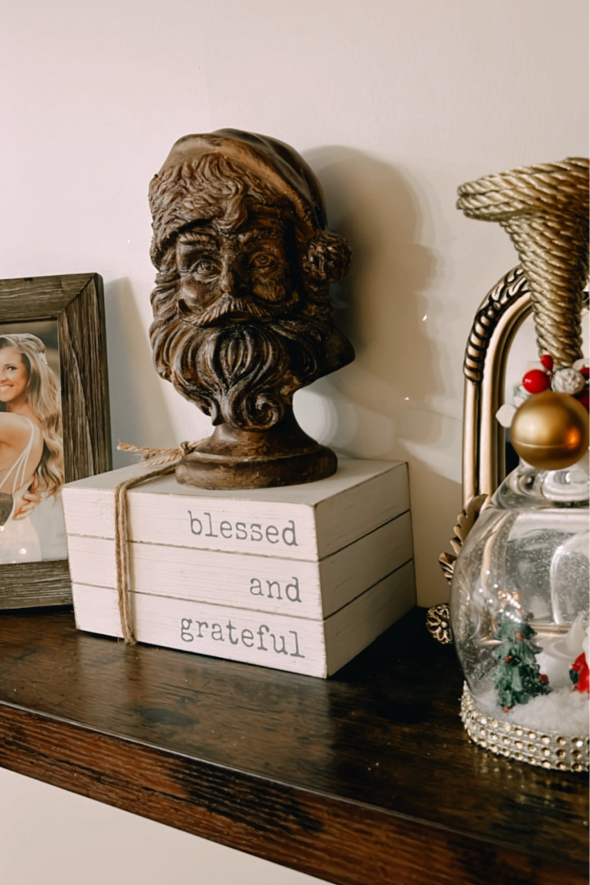 Santa Claus is coming to town! This decorative Santa bust has a wood-like appearance and would be charming placed on a fireplace mantel along with a Christmas garland, LED candles and more.

#LTKHoliday #LTKOver40 #LTKSeasonal