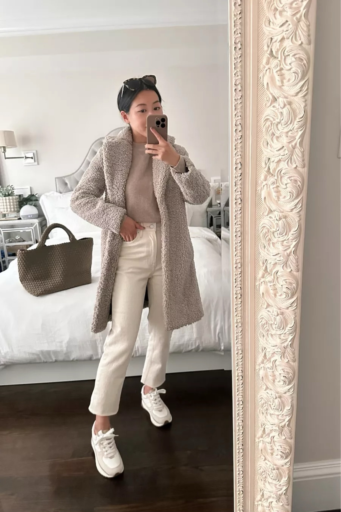 cozy sherpa jacket fall to winter outfit // tonal cream & taupe outfit with sneakers 

•J.Crew teddy coat xs petite (note: mine is from prior year, but linked their current version) 
•Quince cashmere sweater xs - code EXTRAPETITE5 for 5% off a first purchase at Quince 
•Everlane jeans sz 24 (hems folded under) 
•Madewell sneakers sz 5H 
•J.Crew sunglasses 
•Naghedi tote bag 

#petite

#LTKstyletip #LTKSeasonal