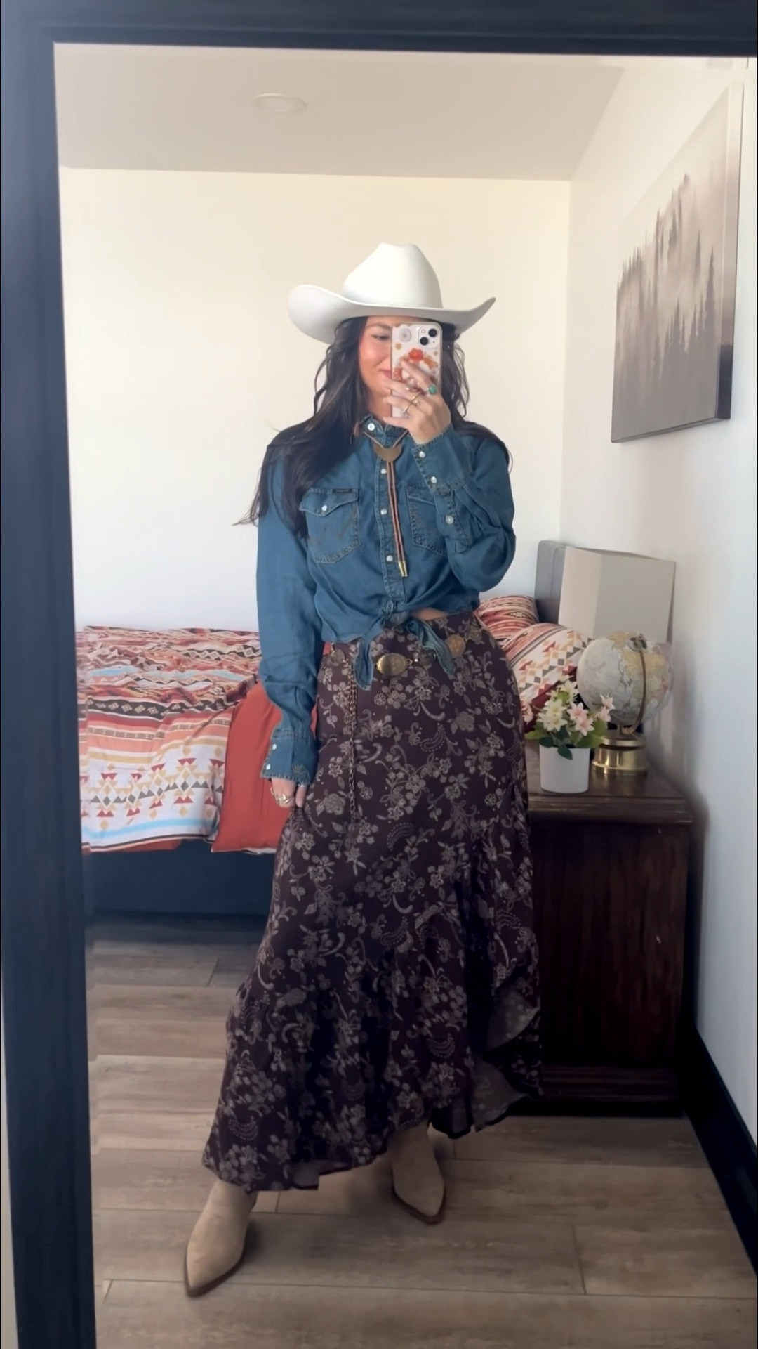 Western chic! The prettiest maxi skirt with slit on the side! Save 20% on boots with code LORI. Wearing xs in both denim button down and skirt

Bolo necklace from November maker 
Earrings from Highway hippie : LORI10

#LTKPetite #LTKShoeCrush #LTKSeasonal