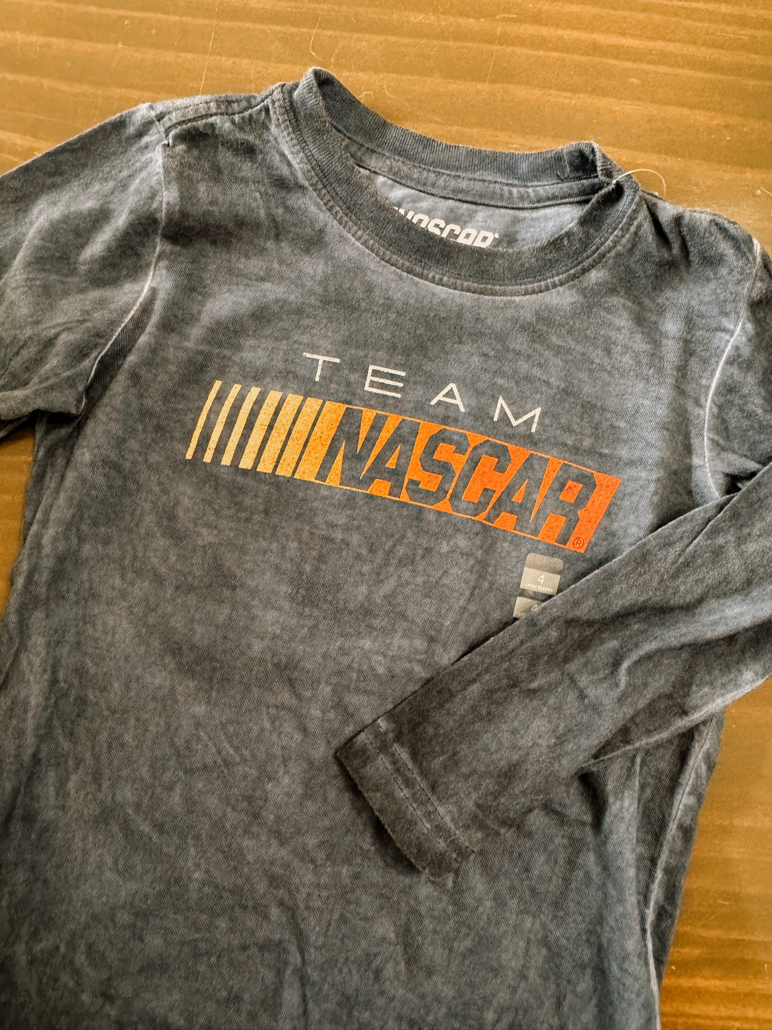 My race car loving boy is going to go crazy when he sees this shirt! 🏎️ There is a car on the back of the shirt too! We love a good graphic tee! 

#LTKFallSale #LTKU #LTKKids