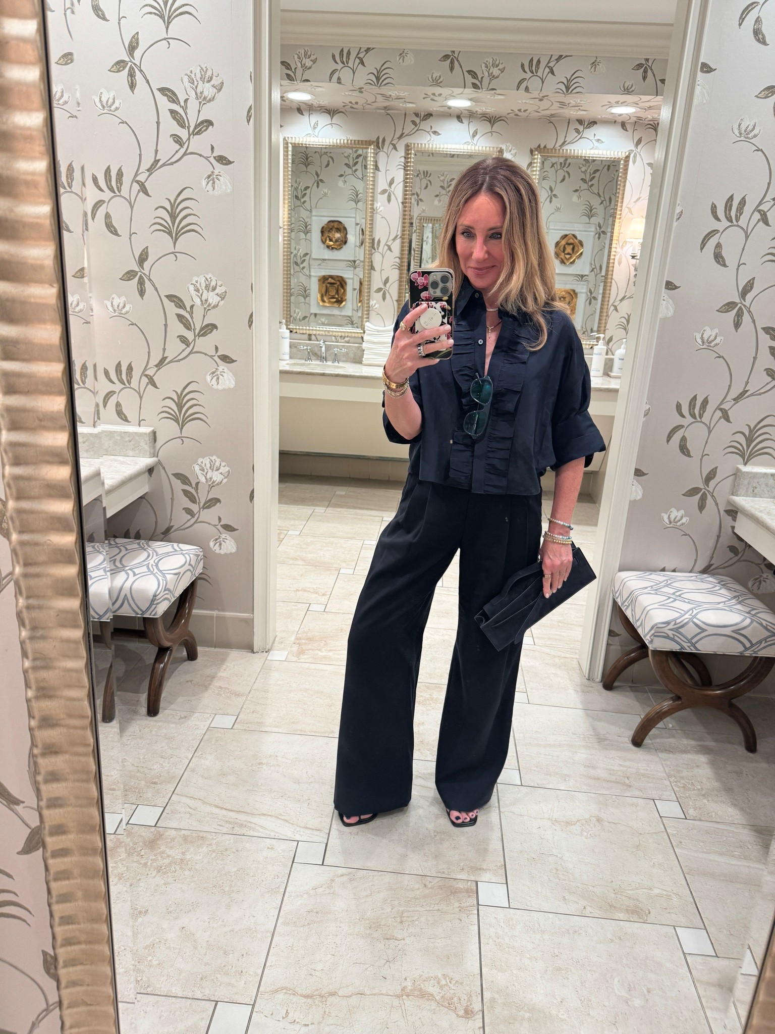 I’m way into monochromatic dressing lately. I already had these navy slacks and have worn them a bunch. I added this navy top recently. I love how it takes the slacks and makes them slightly more dressed down. I’d also wear this top with denim. The little ruffle on the front is a very cool detail

#LTKgrwm #LTKmomlife #LTKootd