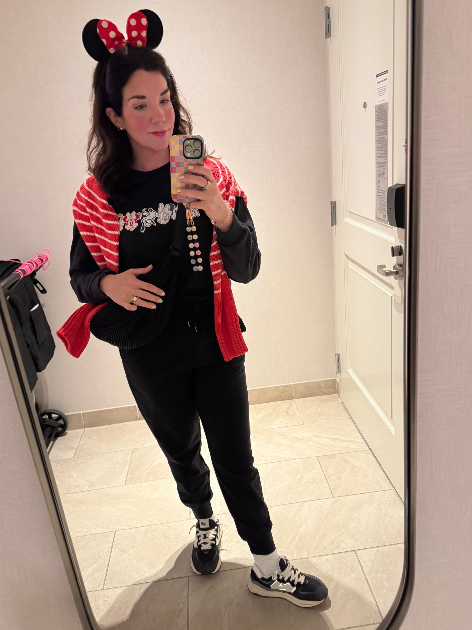 Disney day 1 outfit for the most non-Disney mom out there. Not pictured: my stylish rain jacket. And my VIP my purse- you can barely see. 