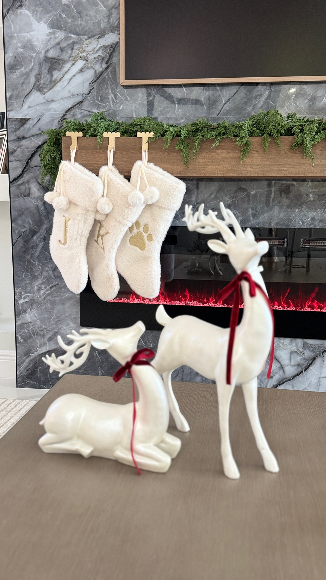 Keeping it simple but festive this year 🎁✨ My Amazon Christmas finds make decorating so easy — stocking holders, mini wreaths, and the cutest pre-made bows! 

#LTKSeasonal #LTKHome #LTKHoliday