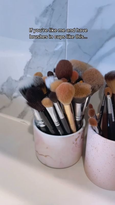LINK IN BiO 🌟 Tired of your makeup brushes rolling around like tumbleweeds on your counter? Say hello to your new BFF: the Makeup Brush Holder! 🎨 With 5 compartments, it's like the VIP section for your brushes, each getting its own cozy spot. No more squabbles over who gets to sit where! 🤗 Grab Yours Here: https://amzn.to/3wxfkNF  ✨ And get this: the lid folds down to cover brushes, like a little blanket tucking them in for the night. Sweet dreams, beauties! 💤 Plus, with the option to organize by brand or brush style, you'll feel like a makeup maestro with everything in its place. 🎶  🌈 Say goodbye to cluttered counters and hello to pristine perfection! 🚀 Finally, you can proudly display your brush collection without fear of chaos erupting. 🌟  💄 So, let's make life a little more organized and a lot more fabulous! Who's ready to elevate their makeup game? 🙋‍♀️ #MakeupMagic  #founditonamazon  #amazonfinds  #amazonbeauty  #makeupbrushes 

#LTKhome #LTKsalealert #LTKVideo