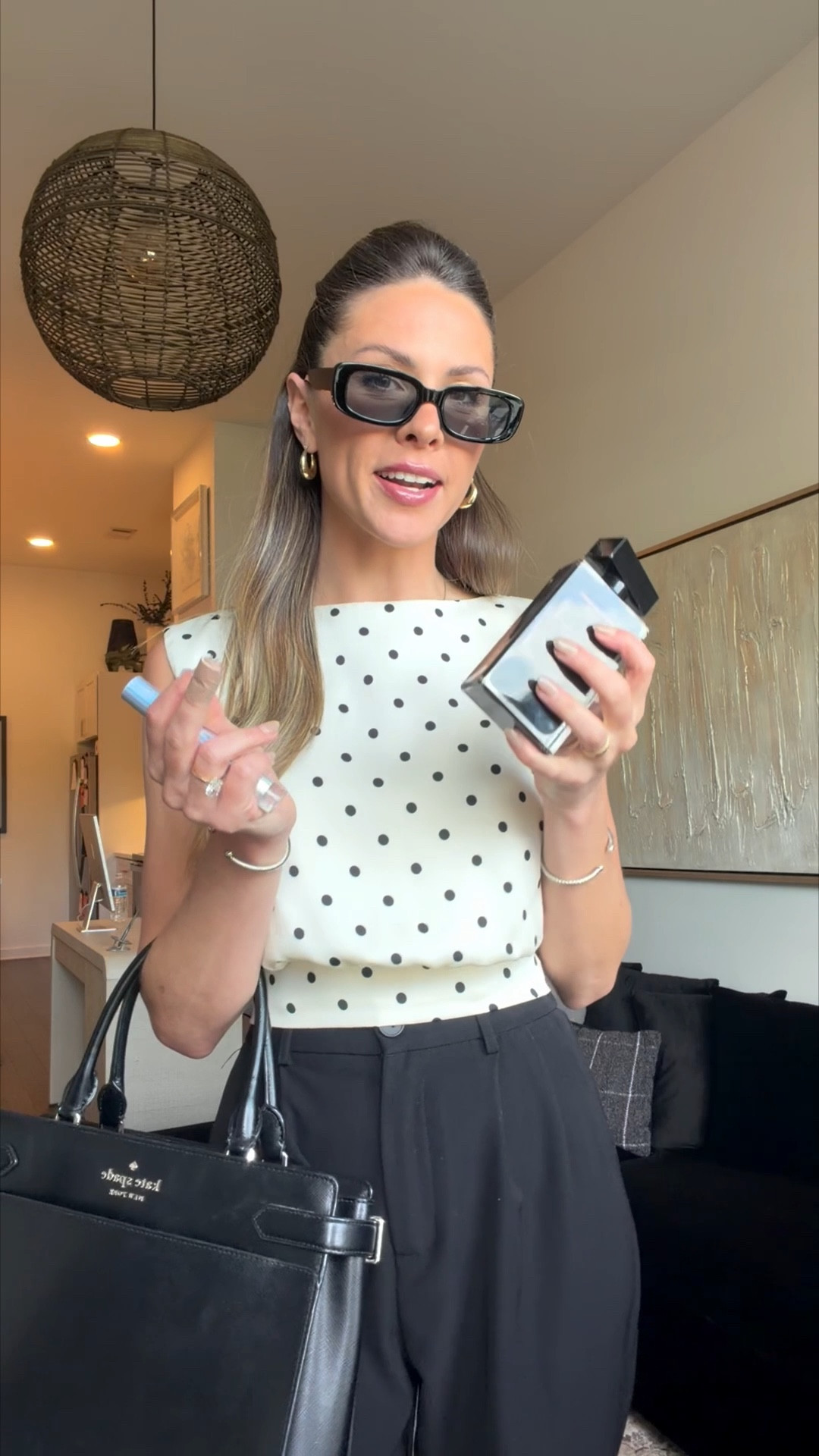 Finishing touches before the work day 🫶🏻 
Sunglasses & Pants @amazon
Top @commense.official 
Purse @katespadeny 
Perfume @narciso_rodriguez 



#LTKootd #LTKWorkwear