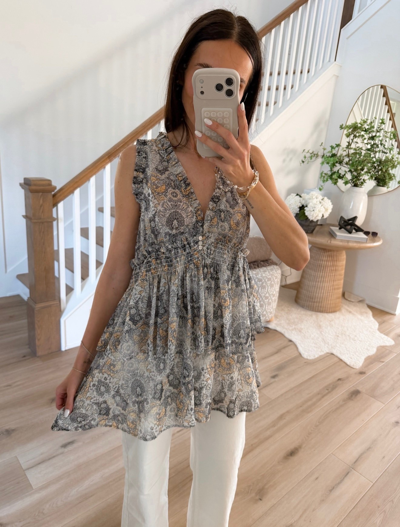 this top is one of those pieces that instantly elevates a simple outfit. the flowy fit and subtle print make it feel feminine but still easy to style. love it paired with white denim for a clean, effortless look. perfect for everyday, lunch plans, or casual nights out

flowy top, feminine style, everyday outfit, white denim look, easy styling, elevated basics, annabrstyle 

#LTKSeasonal #LTKootd #LTKOver40