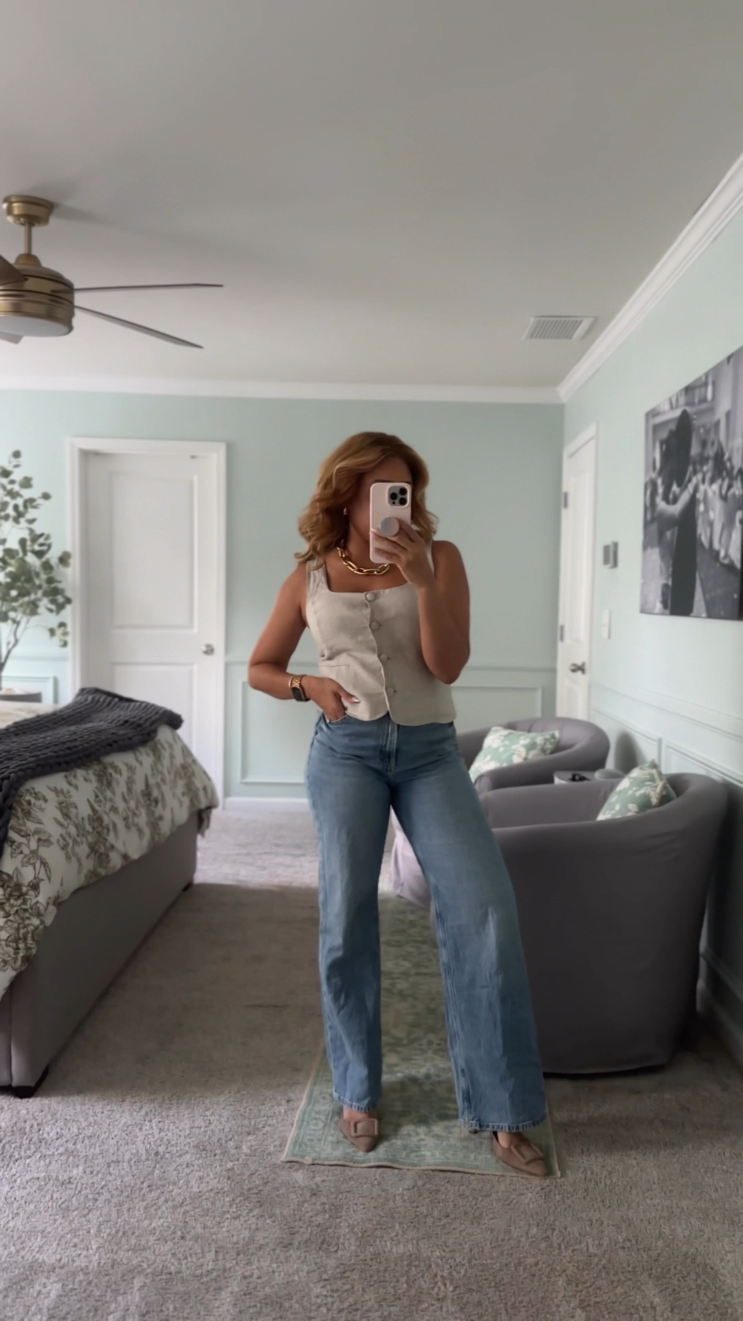 On Mondays, we wear jeans. 🥰 wearing a linen vest top and my new fave jeans (only $30) with some Manolo mules and gold accessories. 