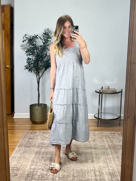 Love this linen maxi dress you will wear for years and years. Classic blue and white stripe. Love the smocked bust and the ruffle details on the body and the straps.  Wearing size small. 

#LTKSaleAlert #LTKFindsUnder100 #LTKSeasonal