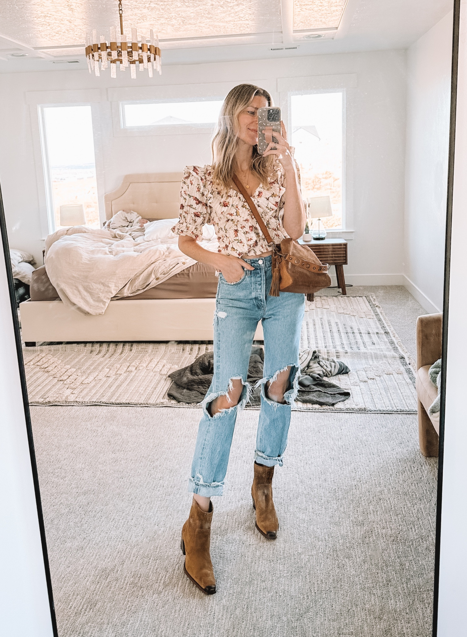 The sun is out so my spring outfits are making a debut! Some of my favorite Agolde jeans I’ve owned for a while, first pair of Vince Camuto boots and the quality is amazing, cute free people floral top I found on sale at Nordstrom (comes in 3 colors) and the cutest little suede crossbody purse that comes in tons of colors!

#LTKSeasonal #LTKSpringSale #LTKstyletip