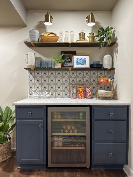 Basement dry bar is a perfect spot for entertaining friends and family! This was a DIY project and I linked the items I could find in stores. 
bar cart | beverage fridge | hosting | basement bar | snack bar | bar styling | countertop | open shelves | sconces | battery lights | tile

#LTKhome