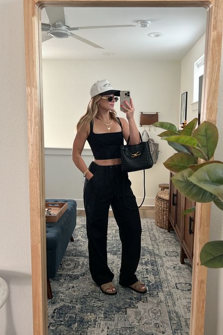 4/4/24 Black on black outfit of the day 🫶🏼 Linen pants outfit, black linen pants, casual spring outfits, casual summer outfits, everyday basics, everyday fashion essentials, capsule wardrobe pieces, Steve madden sandals, spring shoes, spring sandals, summer shoes, summer sandals