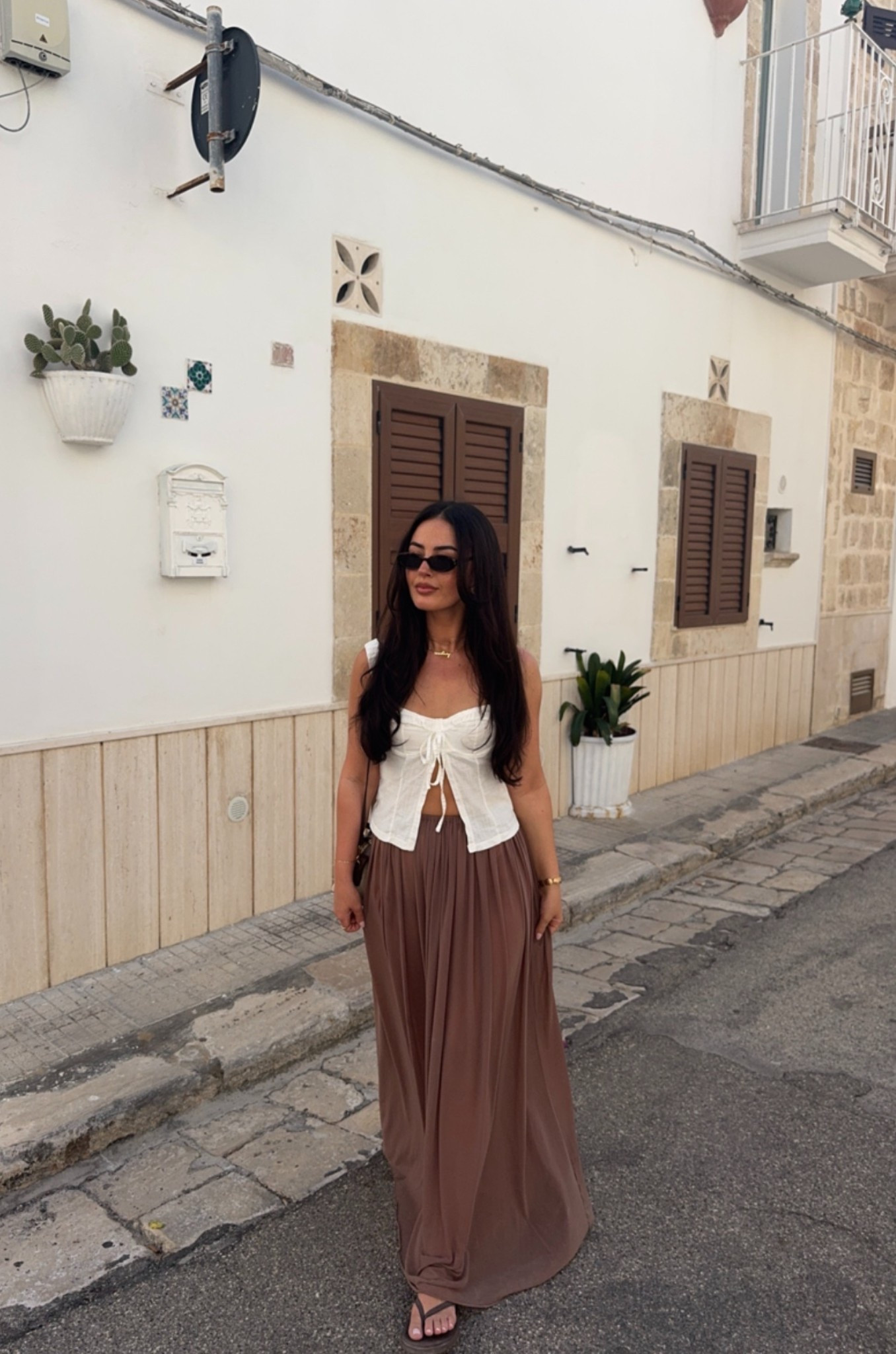 OOTD in Italy 🤎

Brown skirt, maxi skirt, PLT skirt, beach skirt, corset top, winter sun outfits, city break outfits, le specs, Havana's

#LTKstyletip #LTKswimwear #LTKuk
