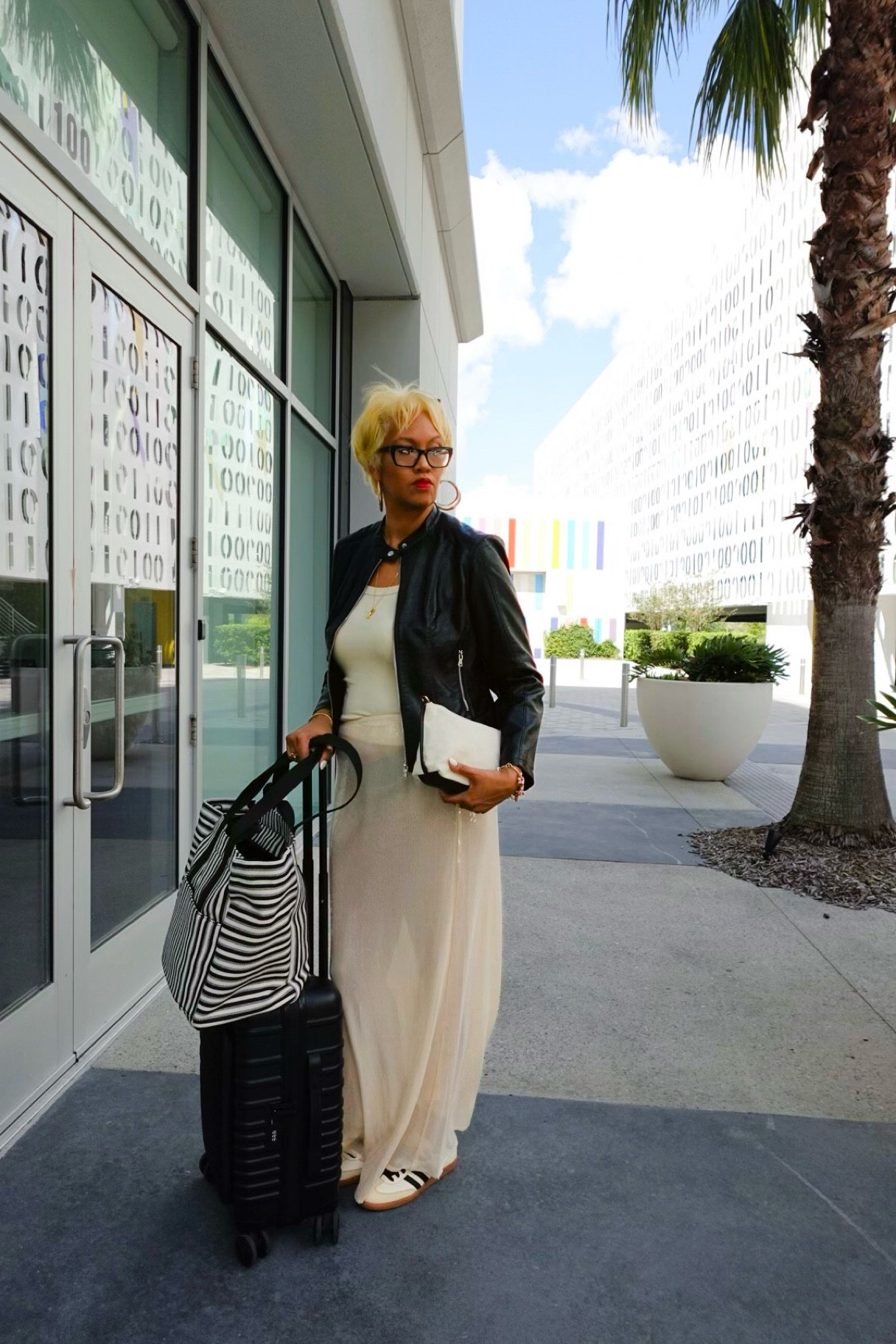Elevating my airport style with this effortless combo! A sleek tank top, flowy skirt, and a leather jacket for that perfect blend of casual and chic 🖤✨ Paired with my trusty Beis luggage and striped tote, I’m ready to breeze through security and straight into vacation mode. 🧳✈️ Who says airport outfits can’t be stylish and comfy?

	•	Download the LTK app and search Pinktravelista or tap my bio LTK to shop this look and more. Sizing and much detail are included in my LTK post.
	•	I am 6 feet tall, weigh 180 pounds, and typically wear small to medium outfits. Tall-friendly exact sizing will be in my LTK caption.
	•	The look and more are linked in LTK. Not familiar with LTK? It’s an app you can download to easily shop all my looks and travel accessories. 😊

#outfitinspiration #EverydayOutfit #OutfitIdeas #VacationFashion #VacationOutfitIdeas #outfitinspo #FashionStyle #FYP #TikTokFashion #AirportOutfit #TravelStyle

#LTKStyleTip #LTKTravel #LTKShoeCrush