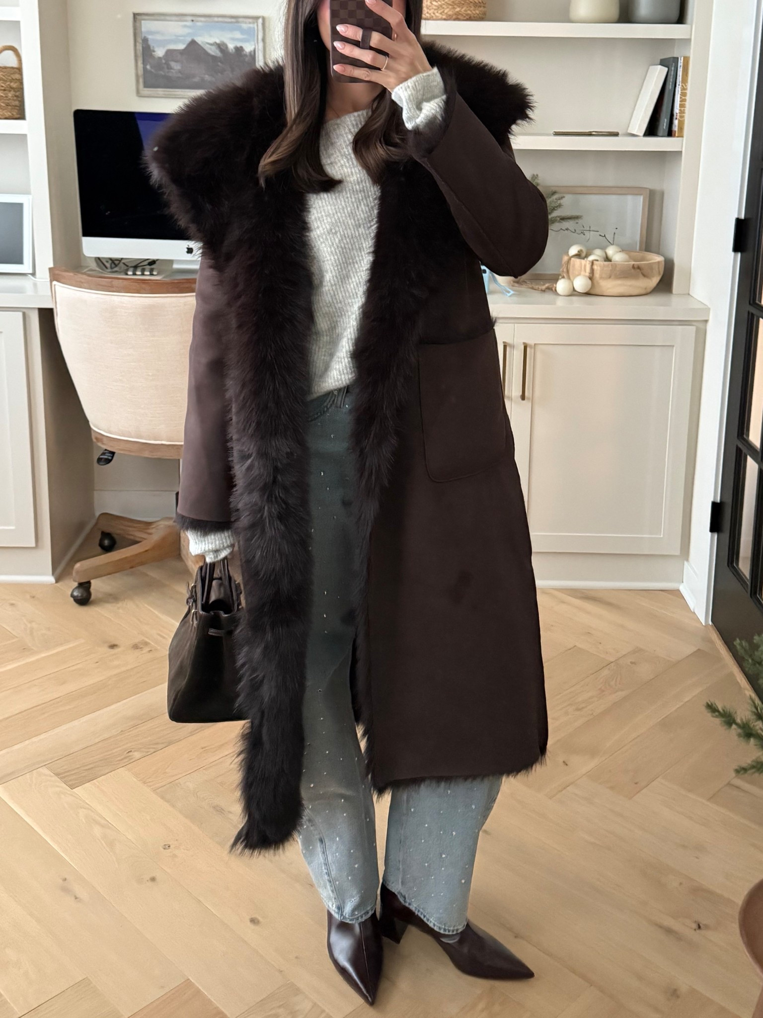 Casual festive date night outfit tonight! 
Reversible shearling jacket: true to size (S) 
Off the shoulder sweater: tts (S)
Rhinestone jeans: true to size (27) 
Boots: size up for half sizes 

#LTKSeasonal #LTKSaleAlert #LTKHoliday