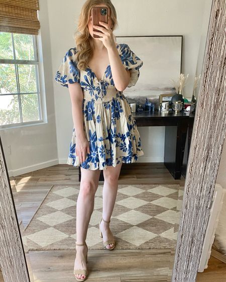 Blue and white floral dress. Special occasion dress. Summer dress. Vacation dress. Free people dress.

Runs a little big, I sized down 1 size