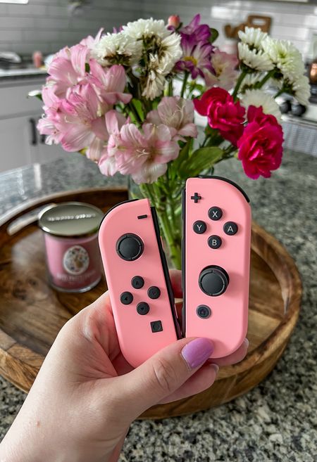 Pastel pink joy con controllers for Nintendo Switch to celebrate the new Peach game. Literally the most gorgeous color and a perfect gift for any pink loving gamers! Video game nights are a staple around here. Fantastic family activity for those bad weather days.

#LTKfindsunder100 #LTKkids #LTKhome