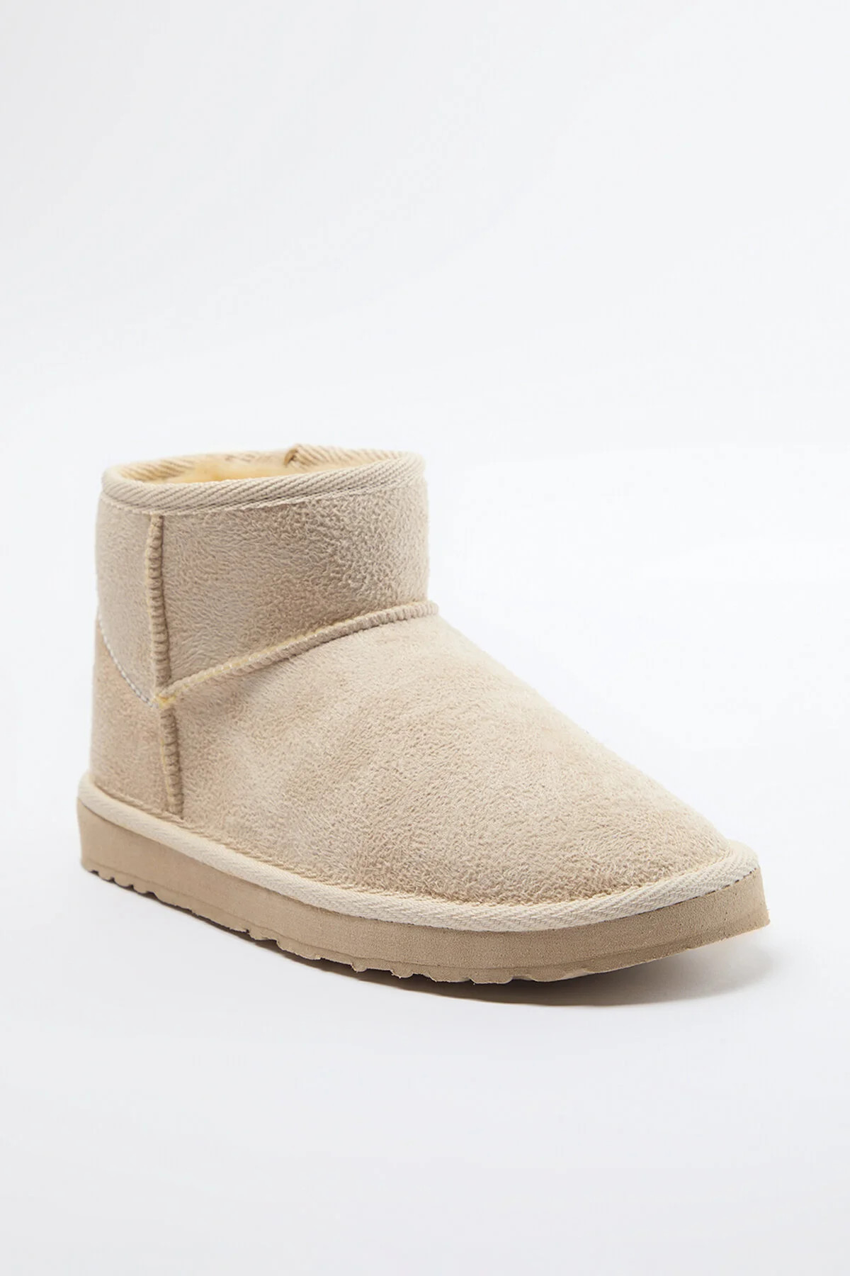 Trendyol Shoes  Beige women's boots with fur inside, round toe and flat flatform heel TAKAW25BO00... | Trendyol DE