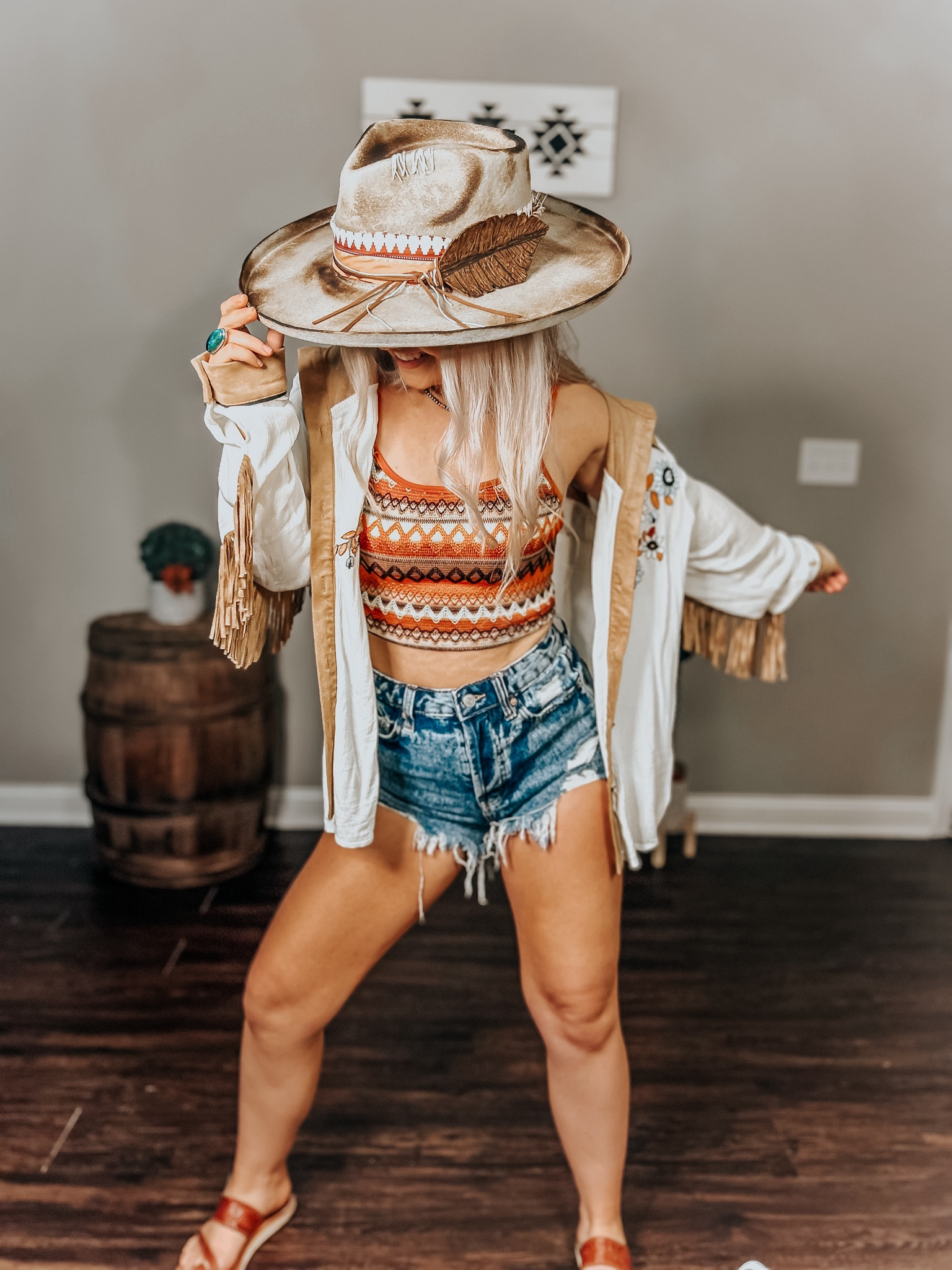 Spring outfit, summer outfit, country concert outfit, camping outfit, jeans, jean shorts, button up, crop tank, Aztec top, cowgirl style, burned hat, unique hat, cowgirl hat, distressed hat, leather feather, summer fashion

#LTKU #LTKswim #LTKstyletip