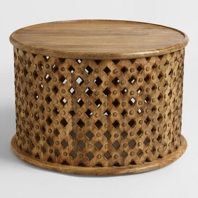 Round Tribal Carved Wood Coffee Table | World Market