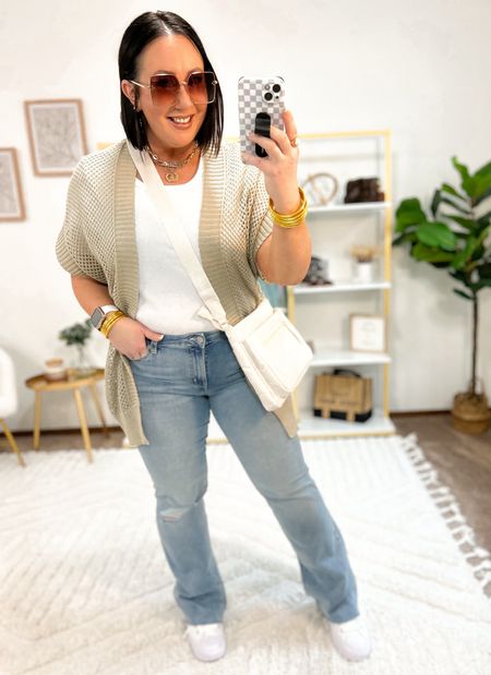 New open knit crochet layering piece styled for spring!  Wearing a the size L/XL. Could possibly size up one though for more room around the hip area. XL ribbed tee. Size 14 mid rise jeans. Right around the waistline on me. Would prefer to try a size up!  Converse fit tts  

#LTKfindsunder50 #LTKmidsize #LTKSeasonal