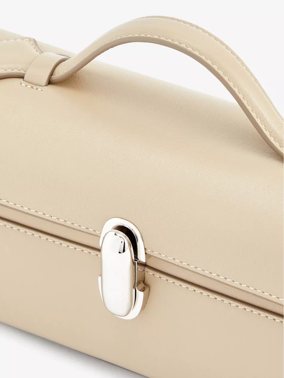 Slim Symmetry Pochette leather top-handle bag | Selfridges
