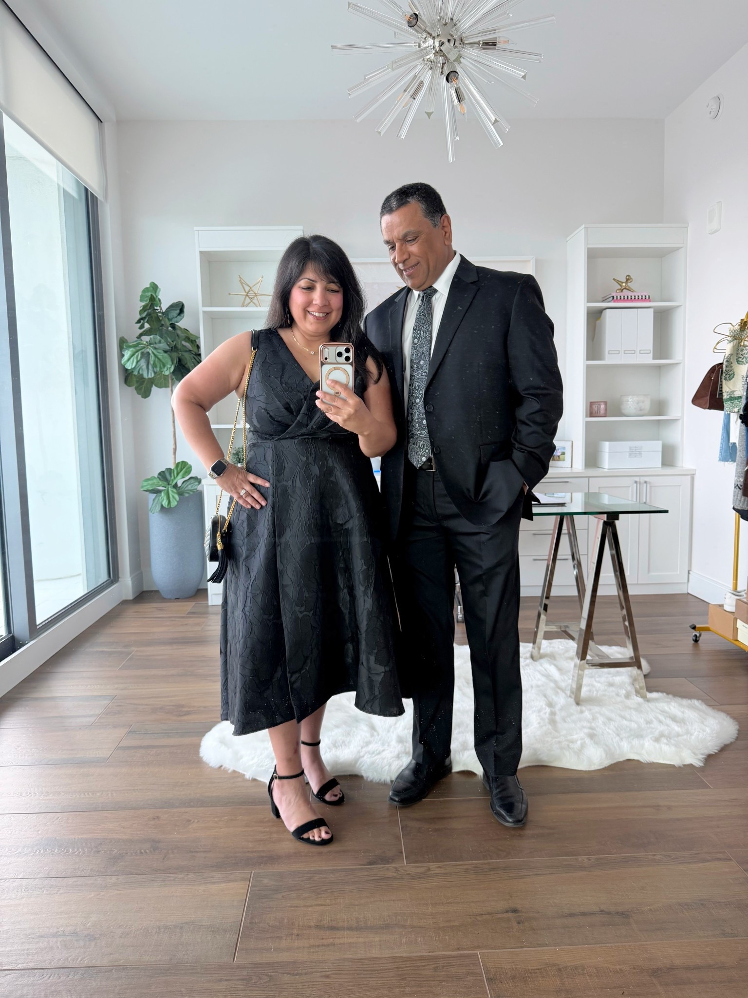 Winter wedding guest outfit, formal holiday party dress, New Year’s Eve outfit and formal wedding guest dress. Available in regular and petite sizes. The black on black material and design is so pretty and elegant! 

Wedding guest dress size 12 petite. Amazon black strappy heels true to size. YSL Mini Lou bag.

Men’s wedding guest formal black suit linked below too. 

#LTKHoliday #LTKWedding #LTKMens