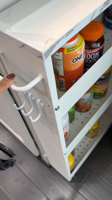 I was looking for a small, compact shelf for our vitamins. My husband found the perfect rolling cart. This cart can be used for many other items. Matches our kitchen cabinet perfectly. #rollingcart #home #kitchen #compact #homegoods 

#LTKhome