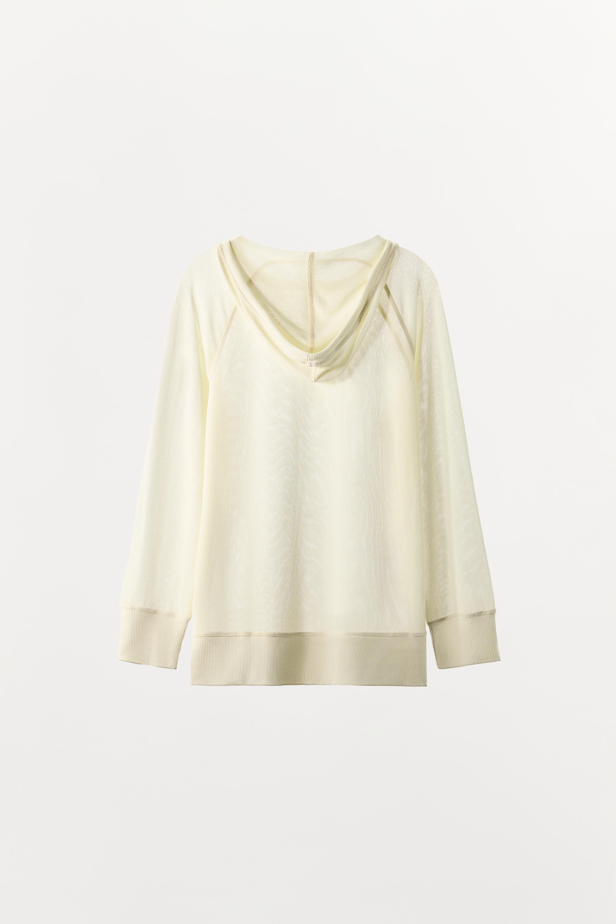 DescriptionCompositionMeasurementsSweatshirt crafted from semi-sheer fabric. Round neck with adju... | Zara UK