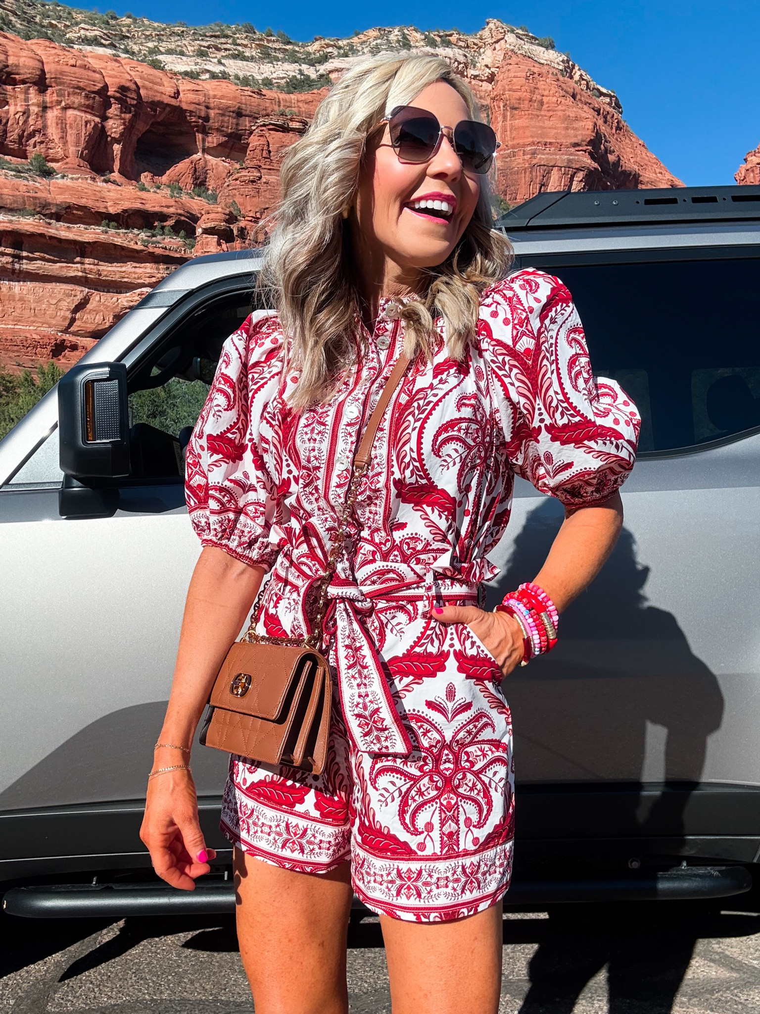 a suitcase full of farm rio!! wearing XS in this stellar spring romper || 

#LTKTravel #LTKSeasonal #LTKOver40