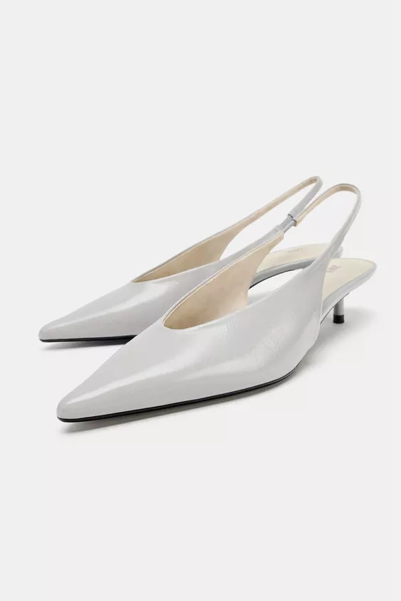 Heeled backless shoes made of leather. Back strap with elastic detail. Slim kitten heel. Pointed toe.

Heel height: 1.6 inches (4 cm) | Zara Canada