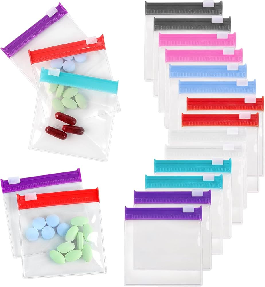 Reusable Zippered Pill Pouch with Slide Lock - 14 Piece Set in 7 Colors - Travel Pill Case for Me... | Amazon (US)