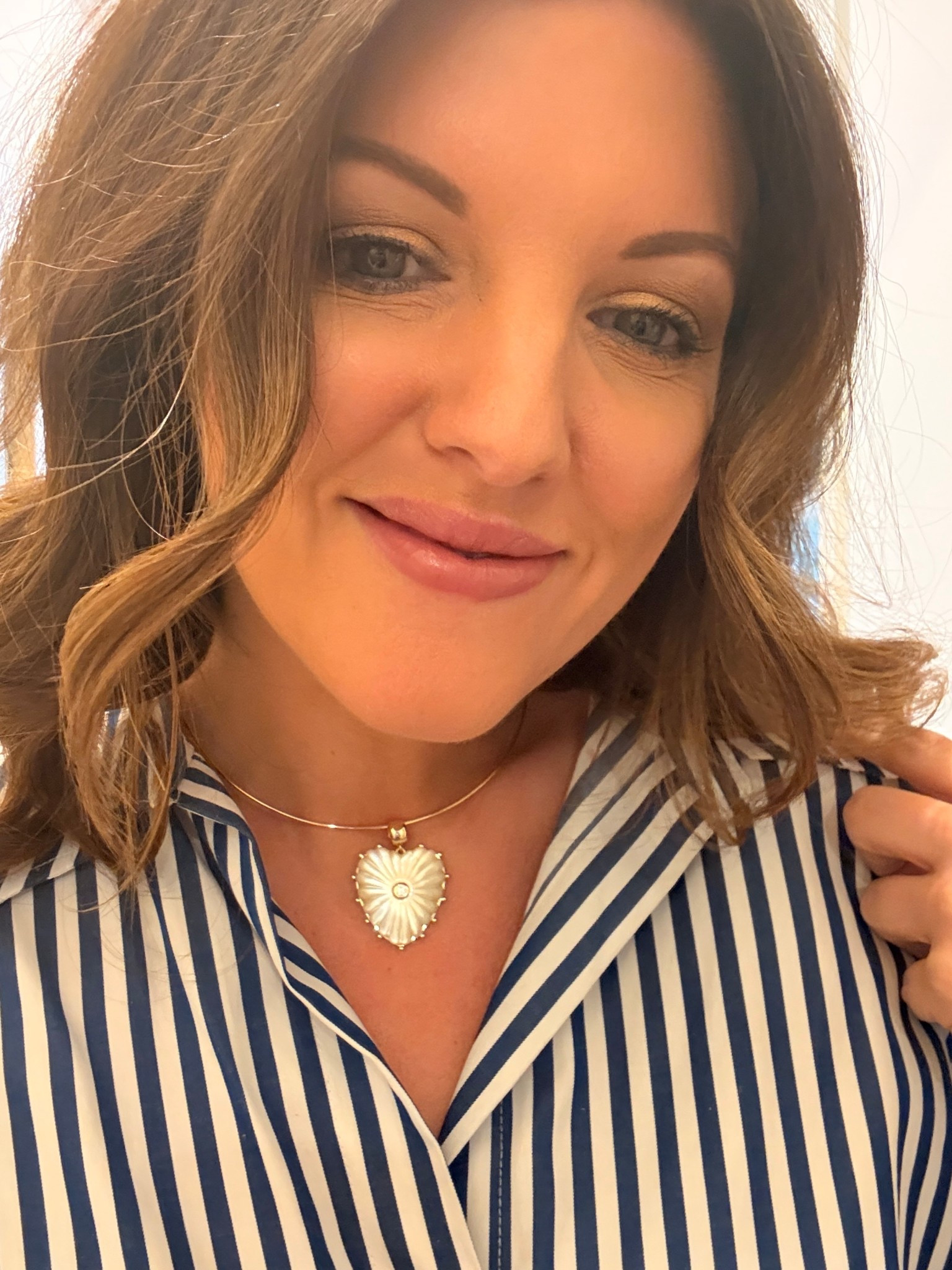 how amazing is this choker heart necklace? Love that I can take it off the metal choker & layer it on a longer chain too 

#LTKootd