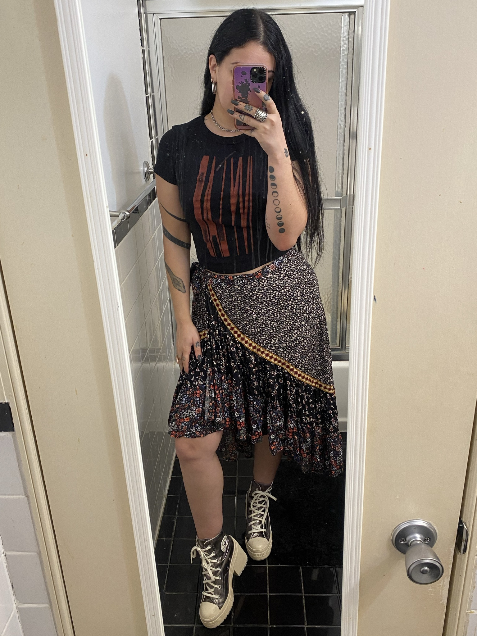 Please forgive the dirty mirror lol! I paired a merch shirt from one of my favorite music groups and paired it with a Free People skirt from 2019! And these silver converse paired perfectly with the grays in the skirt and allowed me to accessorize with silvers to match! A slay! 

#LTKFestival #LTKstyletip #LTKparties
