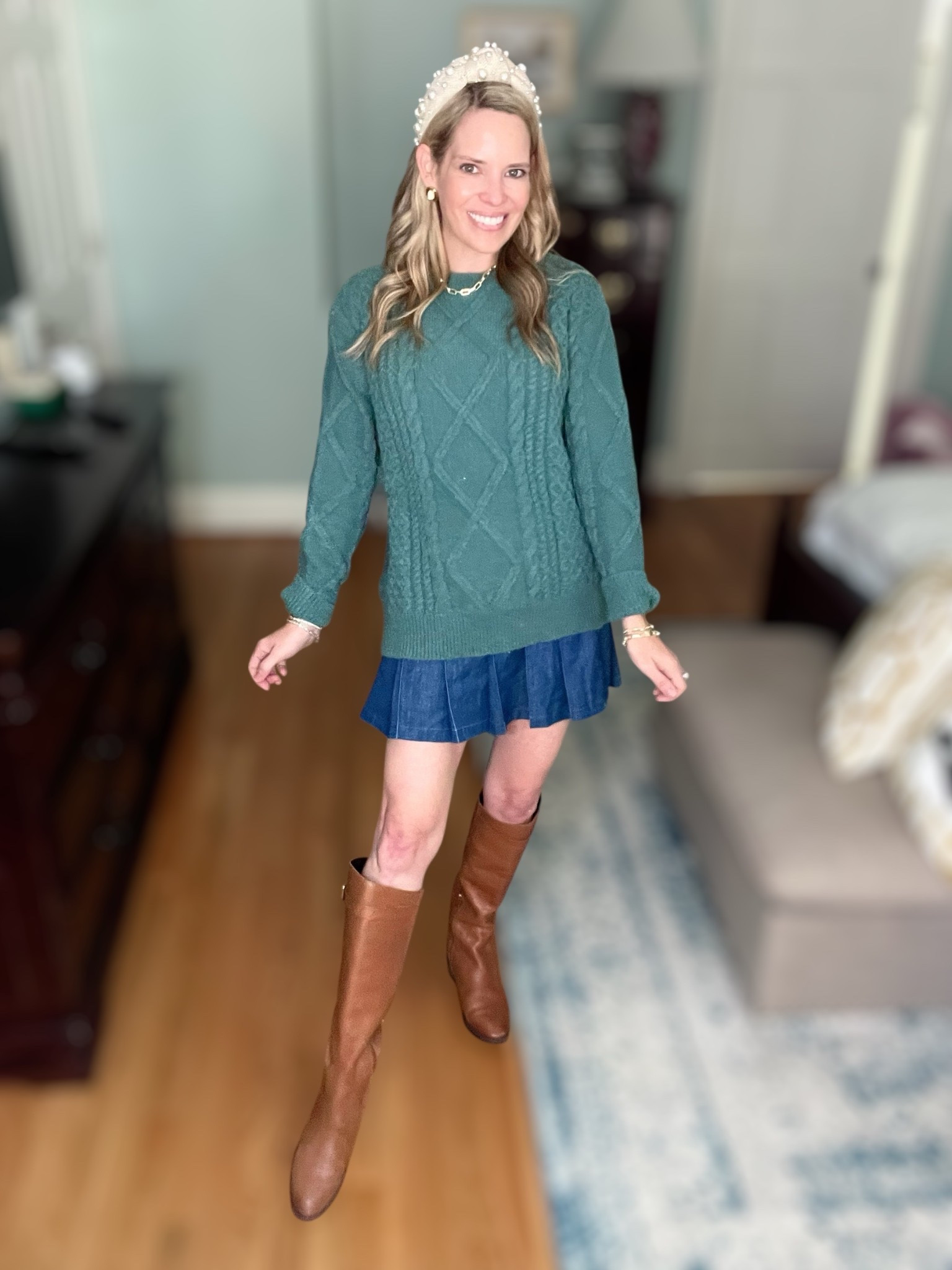 🍃 Cozy cable knit meets preppy chic! I’m wearing this oversized green cable knit sweater from Amazon paired with a flirty blue mini skirt and classic tall brown boots. The mix of textures—chunky knit with soft pleats—makes this outfit perfect for crisp fall days. I styled it with my pearl headband and layered on gold jewelry from Melinda Maria (use code PREPPYREBEL for 10% off ✨).

🛍️ Outfit details:
	•	Amazon oversized green cable knit sweater 💚
	•	Denim/blue mini skirt 💙
	•	Tall brown boots 🤎
	•	Pearl headband + Melinda Maria jewelry for a polished finishing touch ✨

Perfect for: cozy fall weekends, apple picking, or a casual-chic holiday gathering. This look balances comfort and style while giving timeless fall outfit inspiration.

#fallstyle2025 #ltkfall #amazonfashionfinds #cozyknit #preppystyle #falloutfitideas #melindamaria #sweaterweather


#LTKOver40 #LTKFindsUnder100 #LTKFindsUnder50