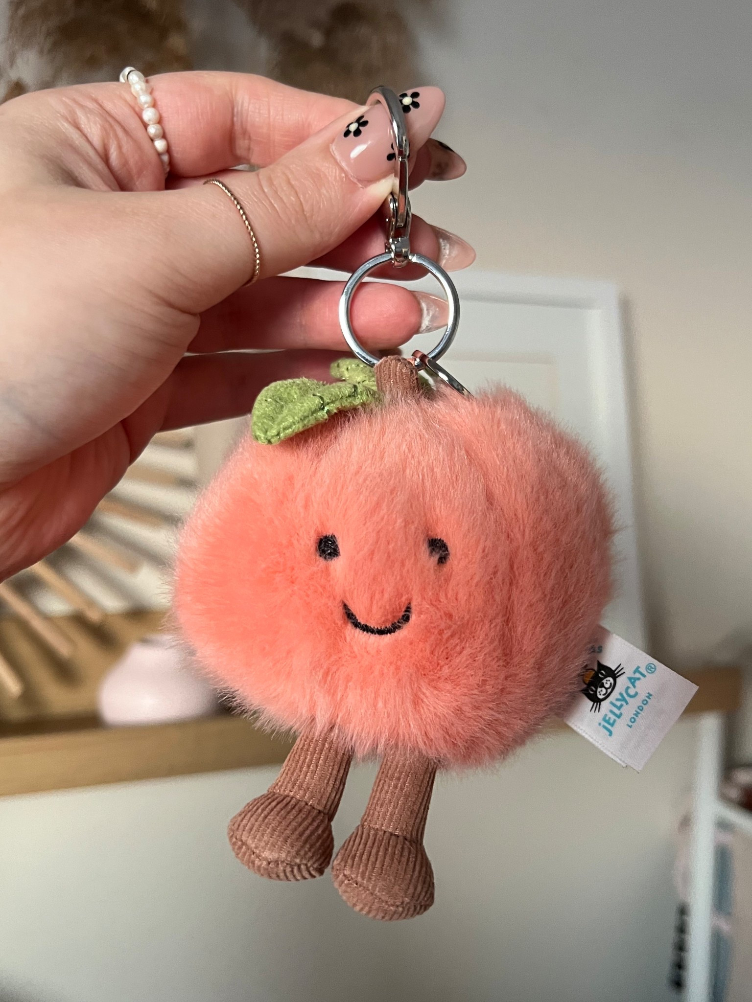 The cutest Jellycat peach bag charm! So perfect for spring 🍑

#LTKsummer