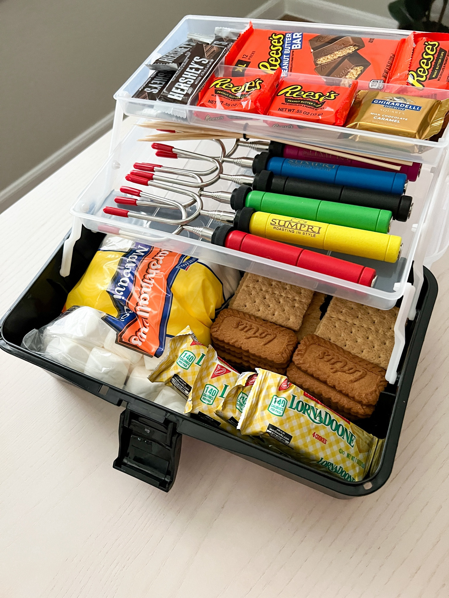 Summer s’mores

Smores caddy 
Roasting forks 

#LTKSeasonal #LTKParties #LTKHome