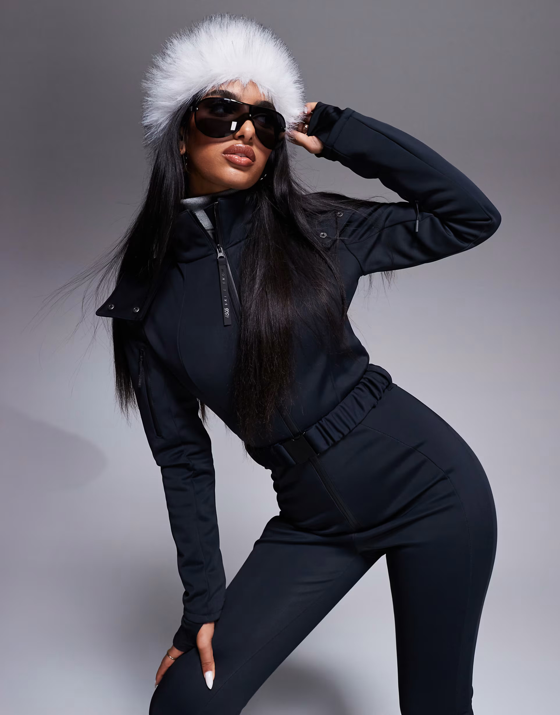ASOS 4505 Ski belted ski suit with slim kick leg and faux fur hood in black | ASOS (Global)