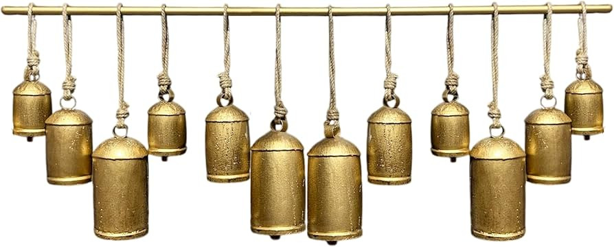 Neyra 48 Inch Wide Decorative Iron Cowbells Wall Decor, Antique Gold Finish, Jute Hanging Rope | Amazon (US)