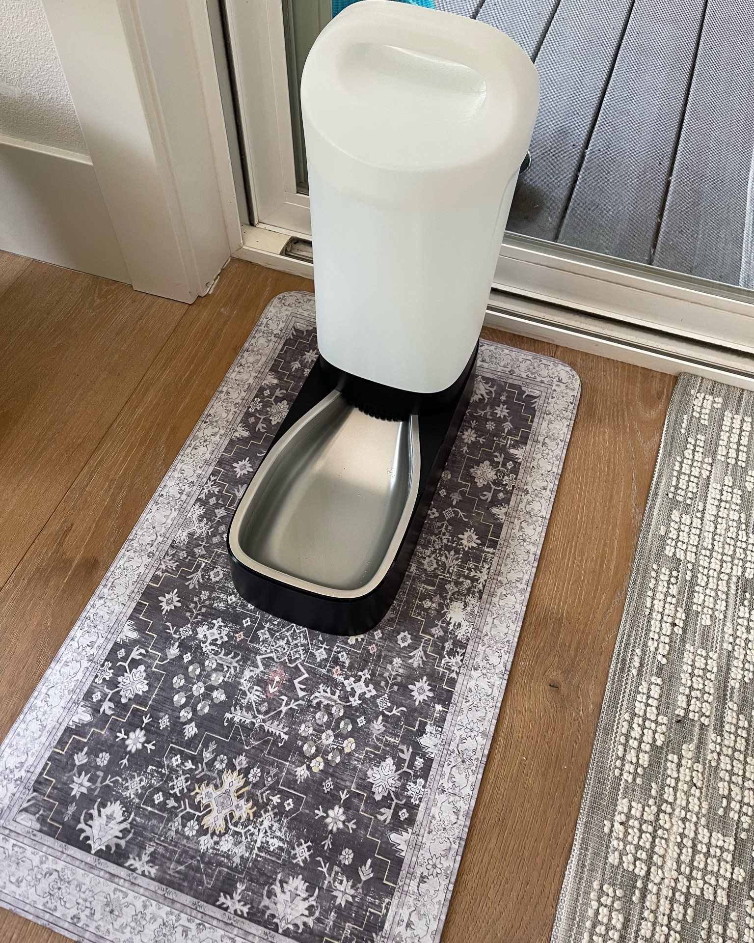 Large capacity gravity feed pet water dispenser with filter. Pet food mat that soaks up water and protects the flooring.

#LTKdayinmylife #LTKHome