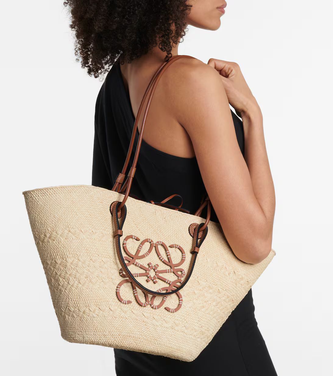 Paula's Ibiza Anagram basket bag | Mytheresa (US/CA)