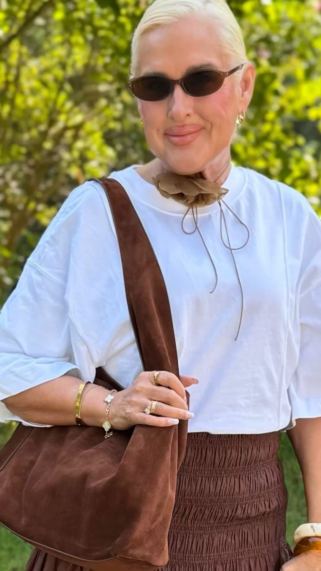 In your 60’s… details are everything.

This is how I elevate a simple outfit using modern, wearable essentials that create a polished, effortless look—perfect for petite women and women over 50 who want to feel current, not dated.

Outfit details:
• Structured white t-shirt (clean lines = instant polish)
• Quality leather belt to define the waist and add structure
• Linen pieces for breathability and texture
• Layered lace camisole for a soft, feminine contrast
• Suede elements to bring in depth and richness
• Pendant necklace to create a focal point and elongate the neckline
• Trending shoe of the season from VIVAIA – comfortable, chic, and perfect for everyday wear

Mixing high-low brands like COS, Quince, and H&M allows you to create a luxury-inspired outfit without the luxury price tag.

This look is all about texture, balance, and intentional styling—the key to looking elevated at any age.

👉 Follow for more over 50 style, petite outfit ideas, minimalist fashion, and elevated everyday looks
#LTKStyle #LTKOver50 #PetiteStyle #PetiteWomen #Over50Fashion #StyleInYour60s #AgelessStyle #MinimalStyle #ElevatedStyle #EverydayOutfit #CapsuleWardrobe #ModernClassic #EffortlessStyle #StreetStyleOver50 #VIVAIA #COSStyle #QuinceStyle #HMStyle #TexturedOutfits #LinenStyle #NeutralStyle #ClassicWithATwist

#LTKSaleAlert #LTKPetite #LTKootd